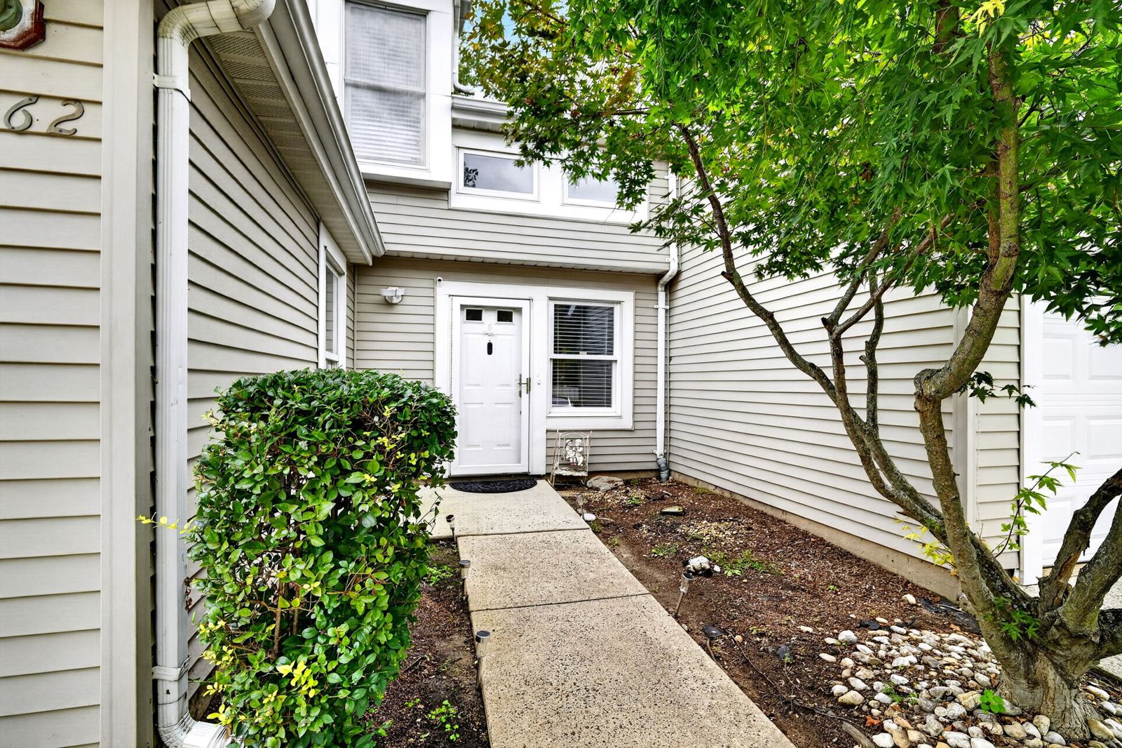 Landscaped front walk to the entry door at 162 Stults Lane