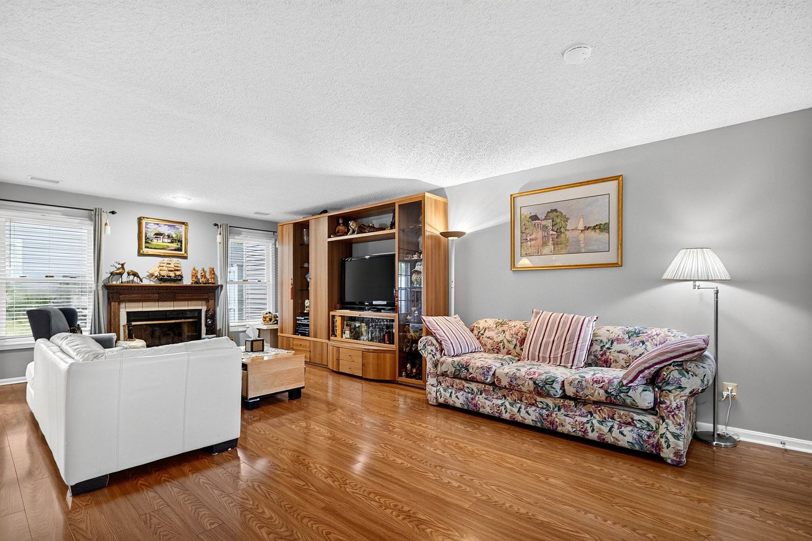 Living area with the wood-burning fireplace on the far wall